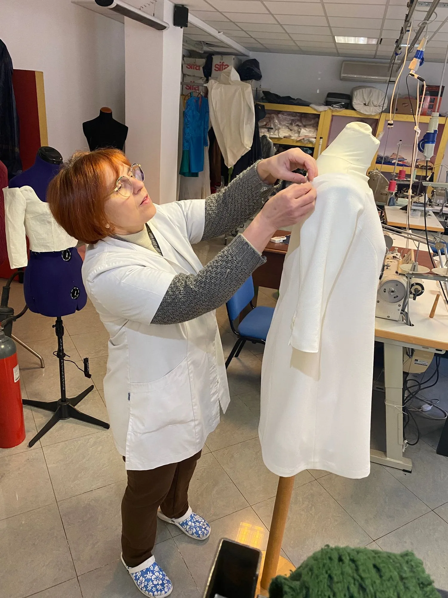 Riparazione cerniera su abito, Sartoria Surace Torino